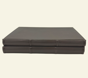 Classic Leather Guestbooks with raised ridges and rounded spine