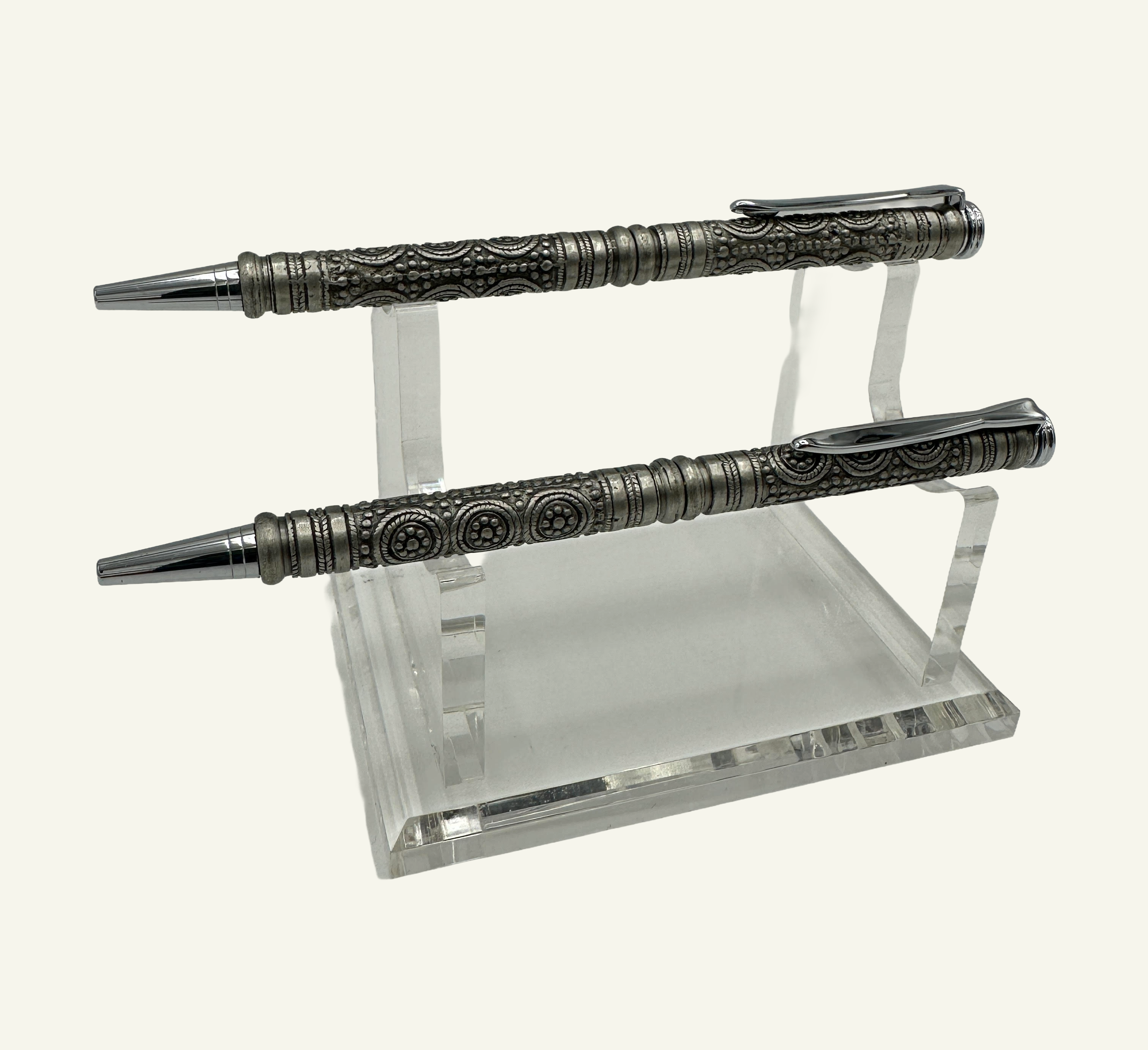 Barocco twist top slim ballpoint pen with ornate silver metal barrel