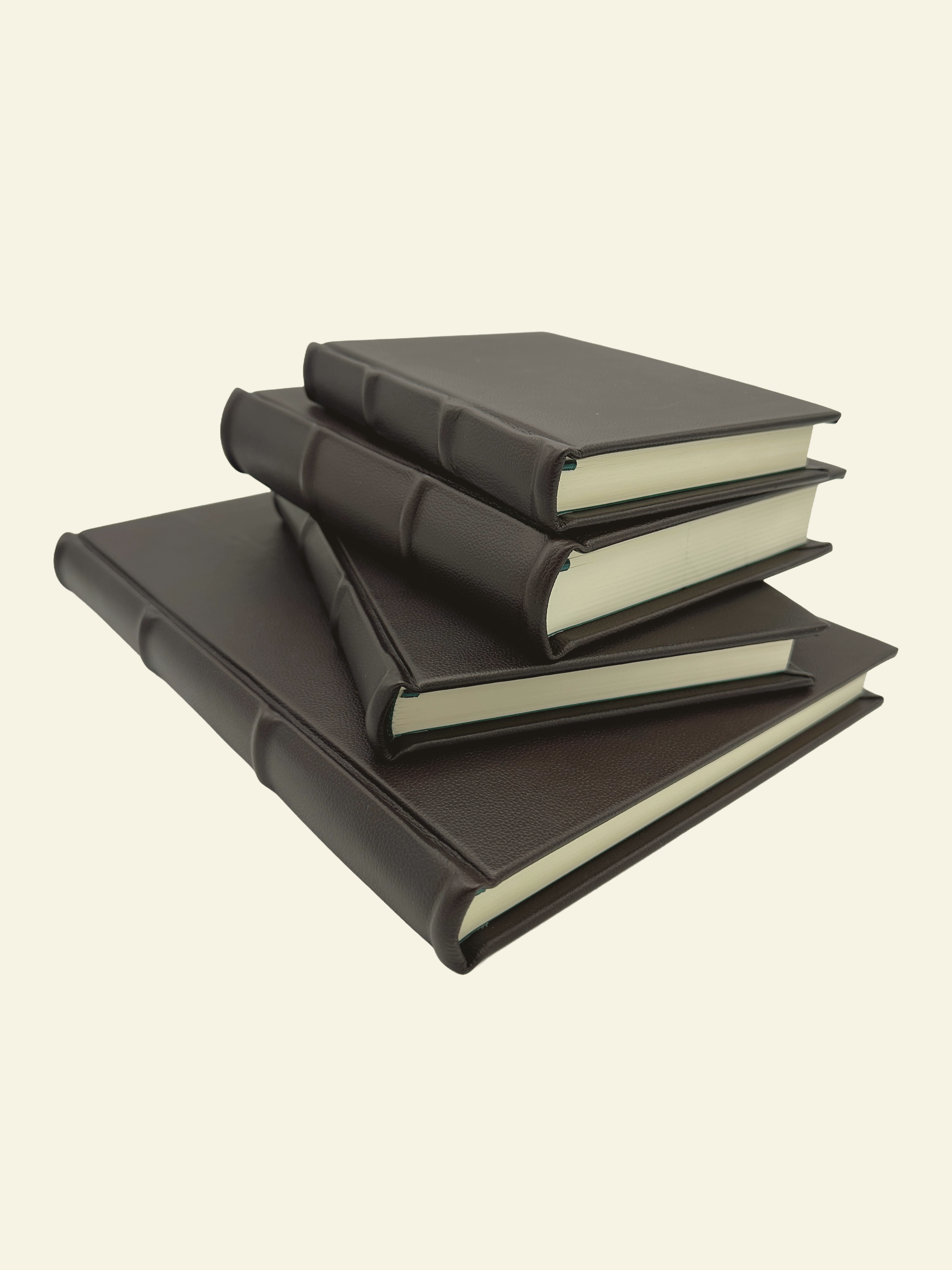 Handmade Italian Leather Journals in Classic Brown. Smooth ages and rounded spine detail