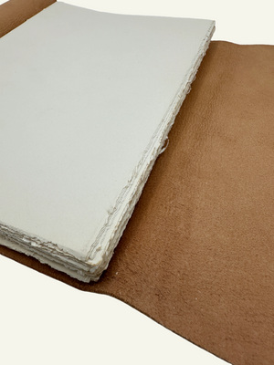 hand deckled-edge archival paper in soft wrap journal
