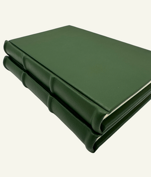 Rounded spine detail for hunter green leather journal with lined pages