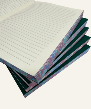 Lined refillable journal insert with marbleized edges in blue and burgundy