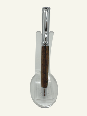 Elegant Italian rollerball pen standing on a display stand highlighting the genuine wood barrel and chrome cap.