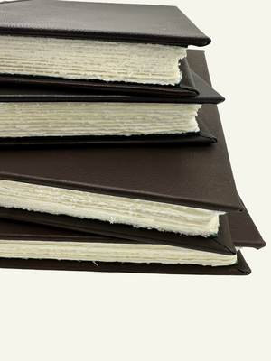 Handmade Italian leather journals and guestbooks with handcrafted Amalfi paper