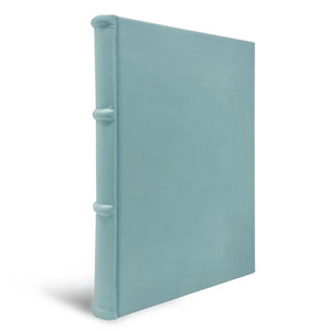 light blue leather notebook features ridged spine