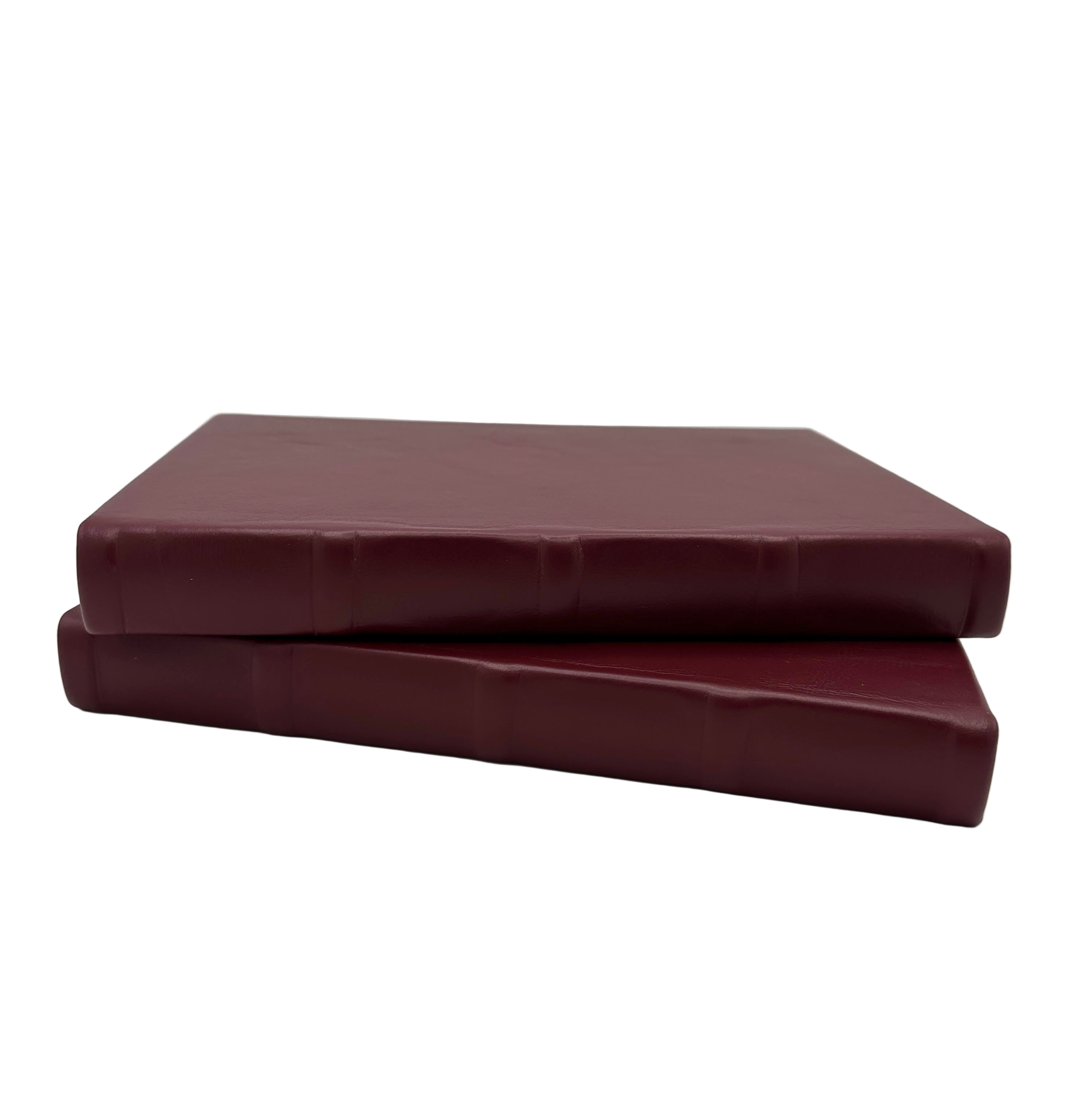stacked-burgundy-lined-journals
