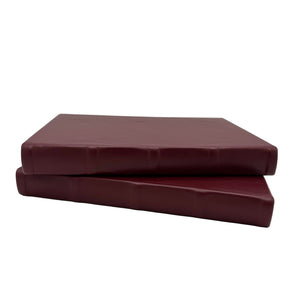 stacked-burgundy-lined-journals