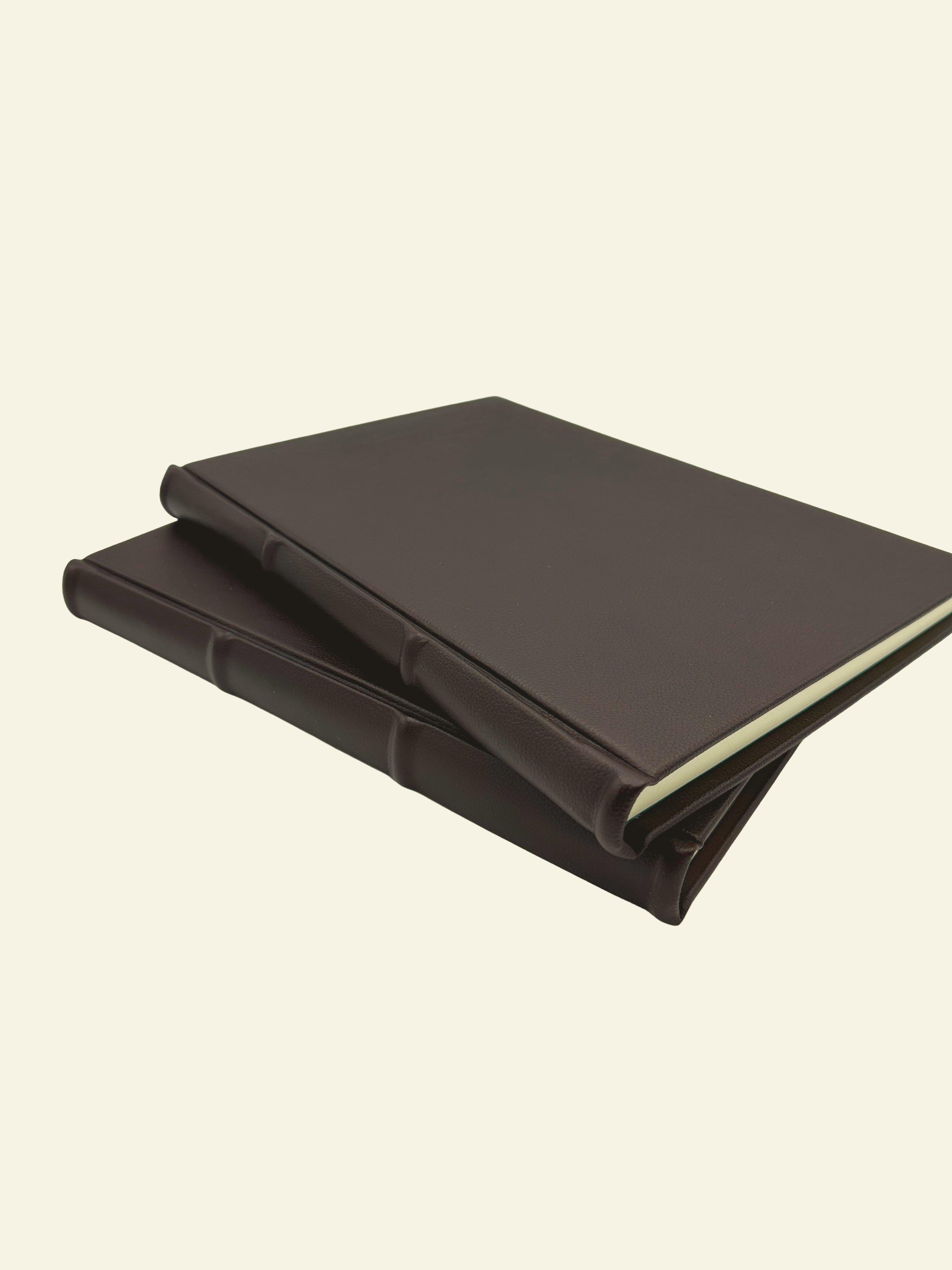 Classic Brown Italian Leather Guestbooks and Journals with rounded spine and raised ridges 