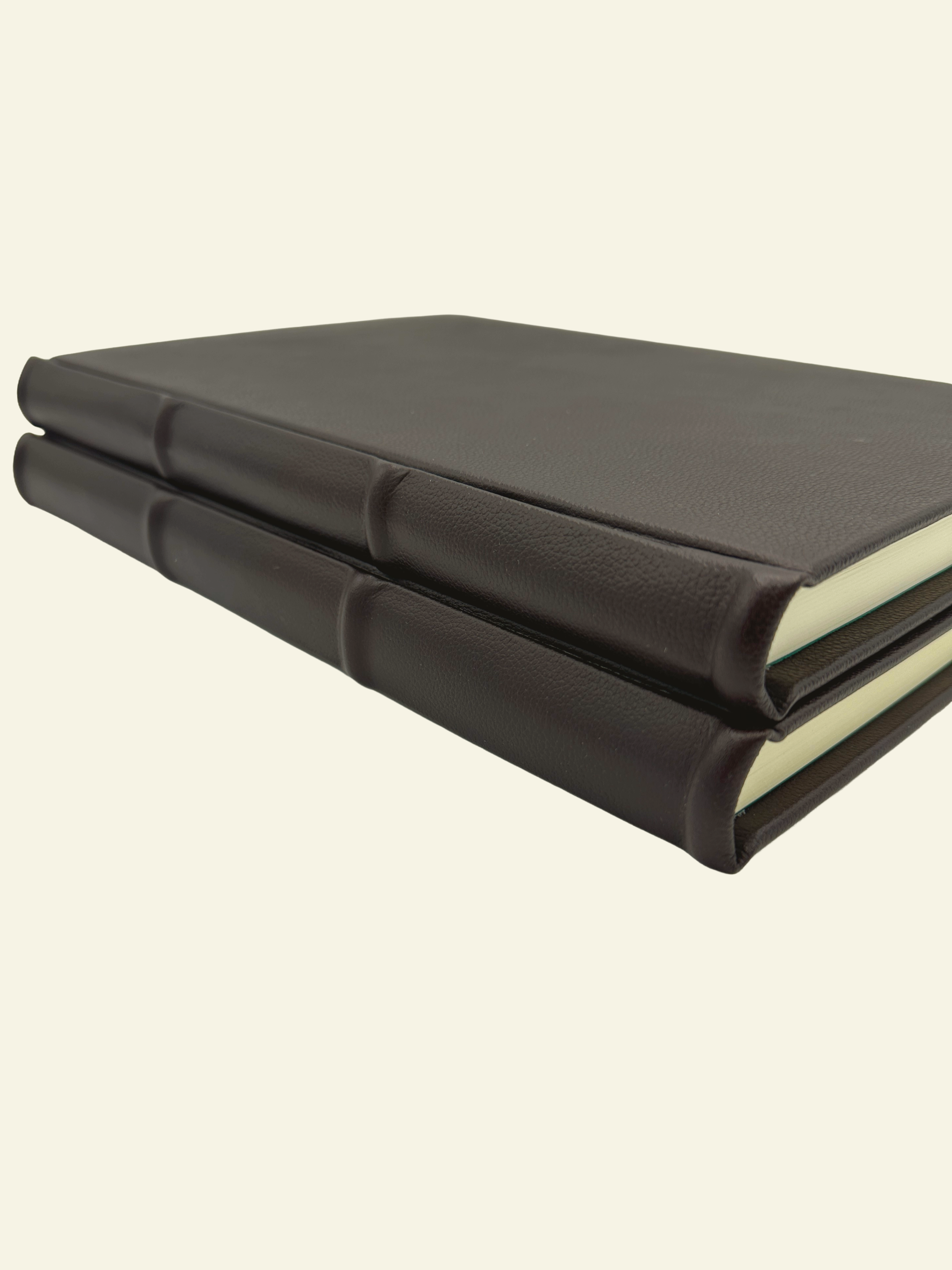 Closeup detail of raised ridges and rounded spine of Epica Guestbooks and Journals 
