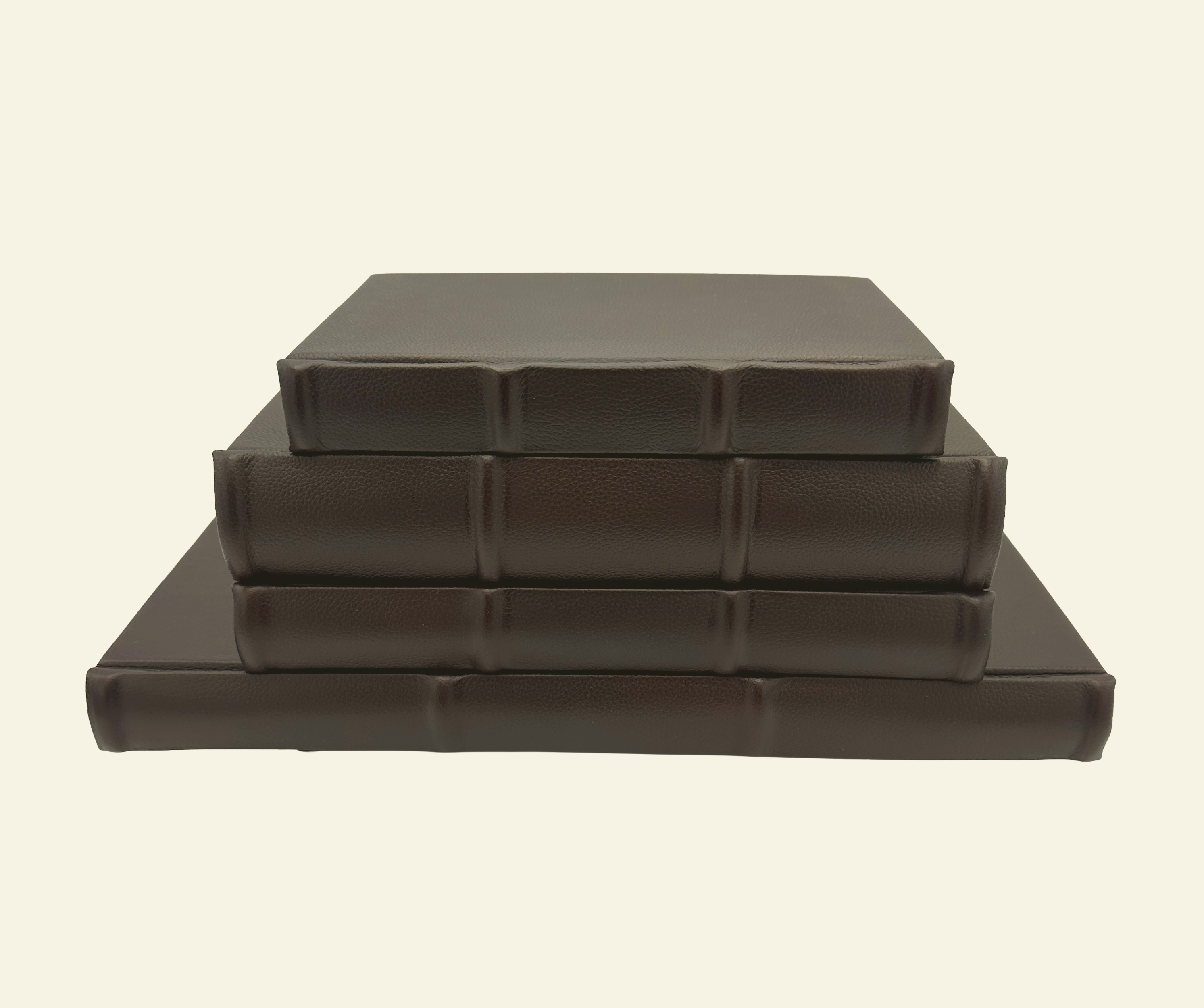 Classic Leather Journals with raised ridges and rounded spine detail in multiple sizes and thicknesses 