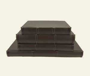 Classic Leather Journals with raised ridges and rounded spine detail in multiple sizes and thicknesses 