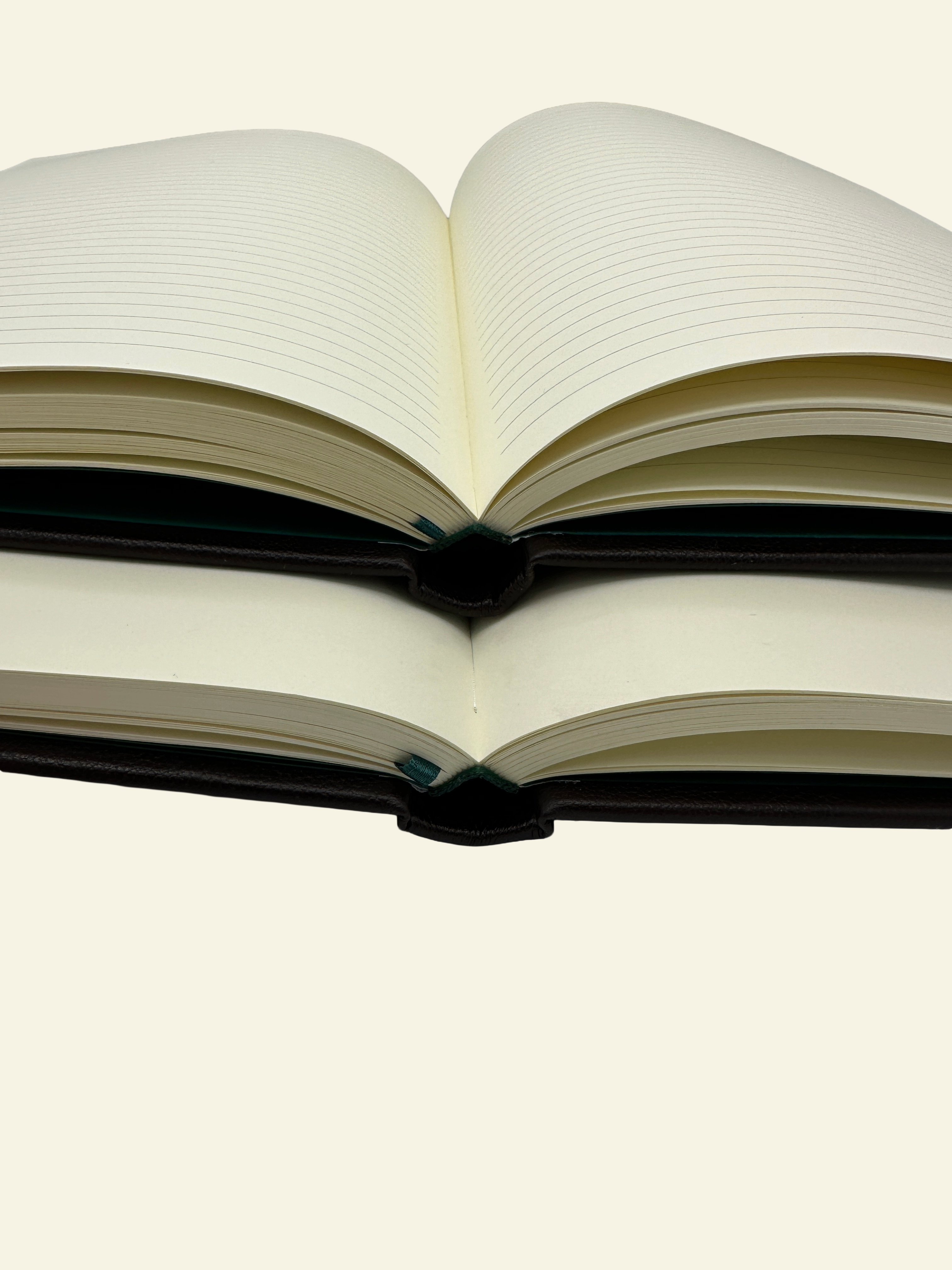 Detailed closeup of open guestbook pages in your choice of lined or unlined pages