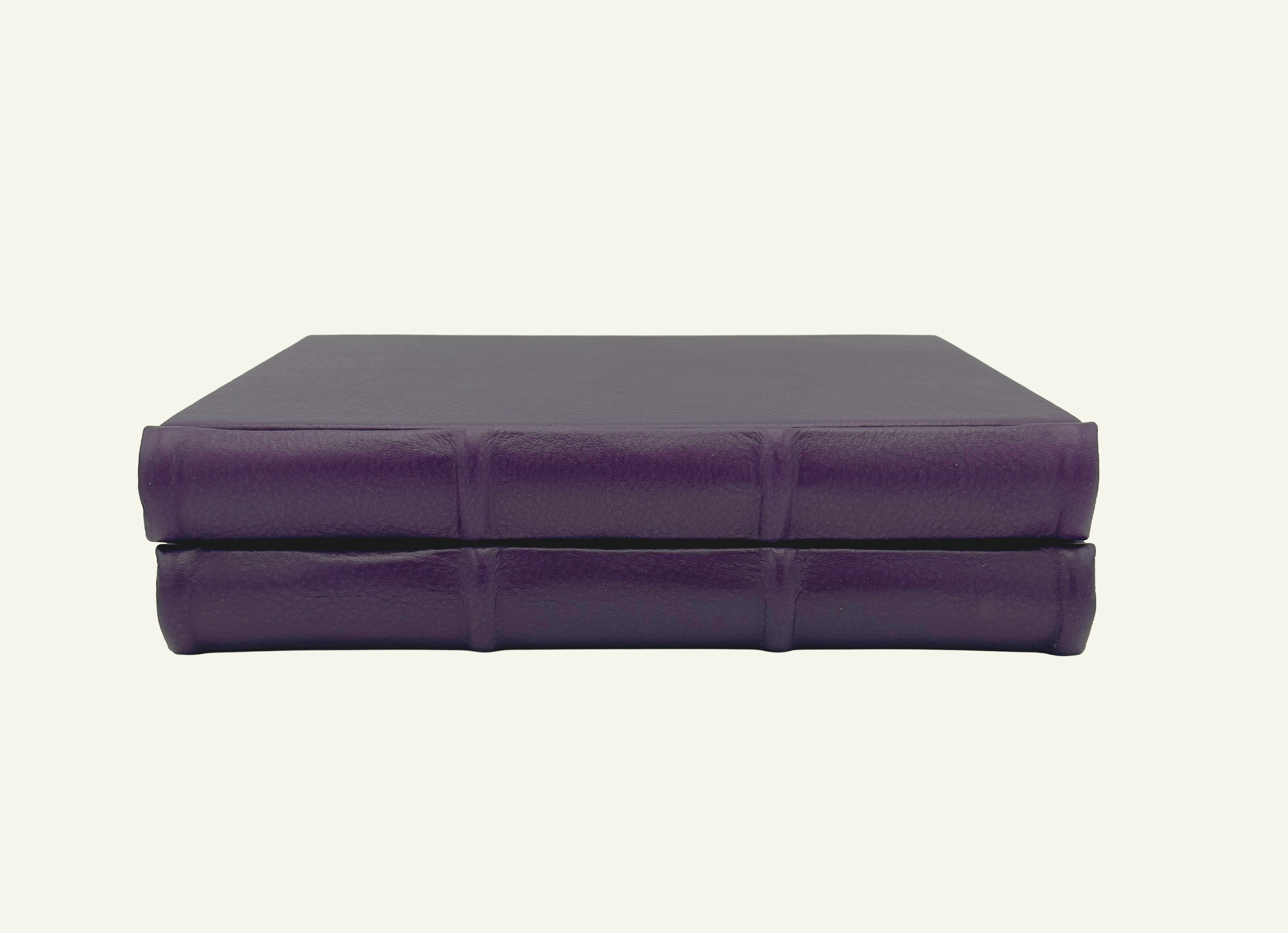 Rounded spine detail for violet leather lined journal