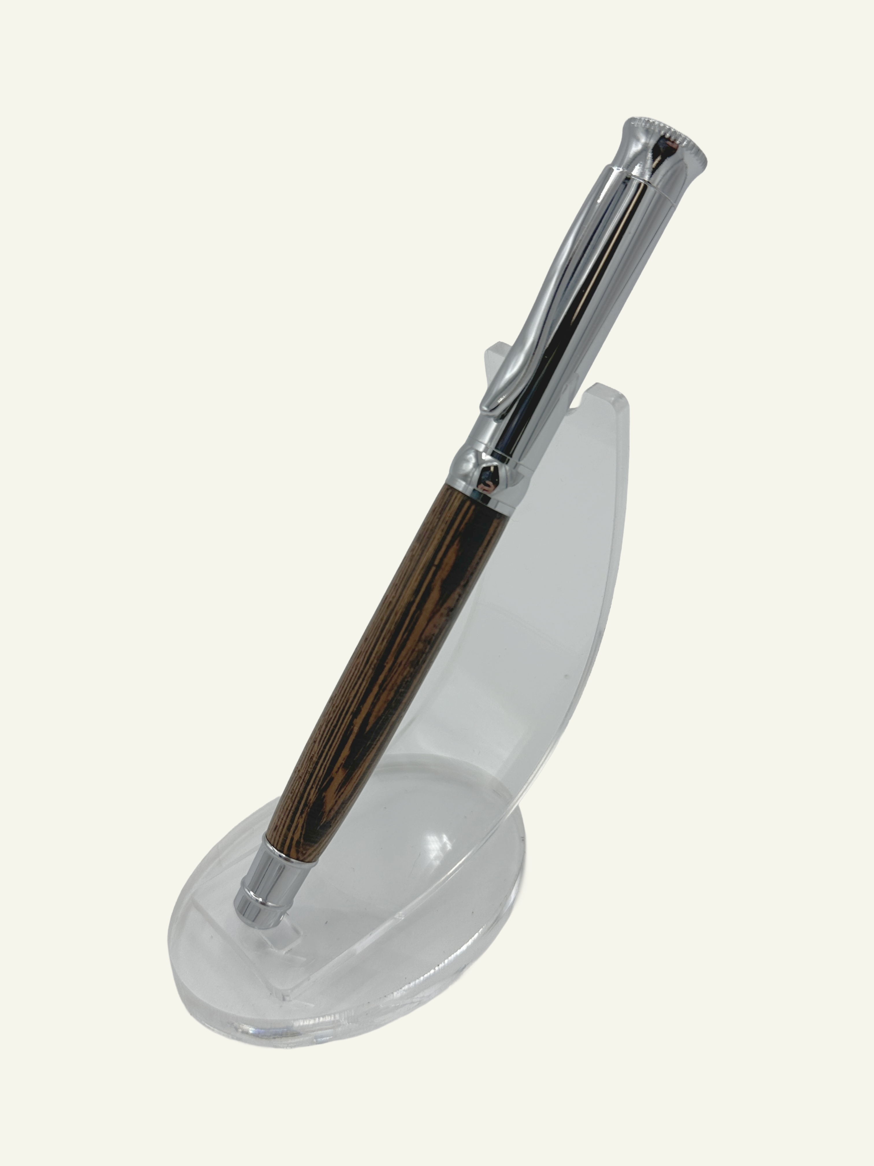 Premium wood barrel rollerball pen with polished chrome accents designed for smooth, effortless writing.