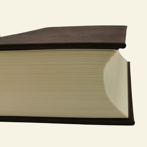 Detailed closeup of the world's thickest journal pages that is 3 inches thick